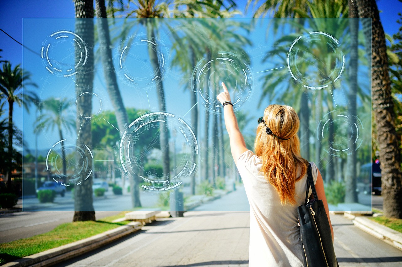 Picture of a girl touching a circle plate in the air with graphic